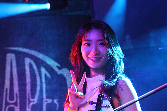 Violet Tree violinist Hyunjin on Oct. 20 poses for a photo on stage.